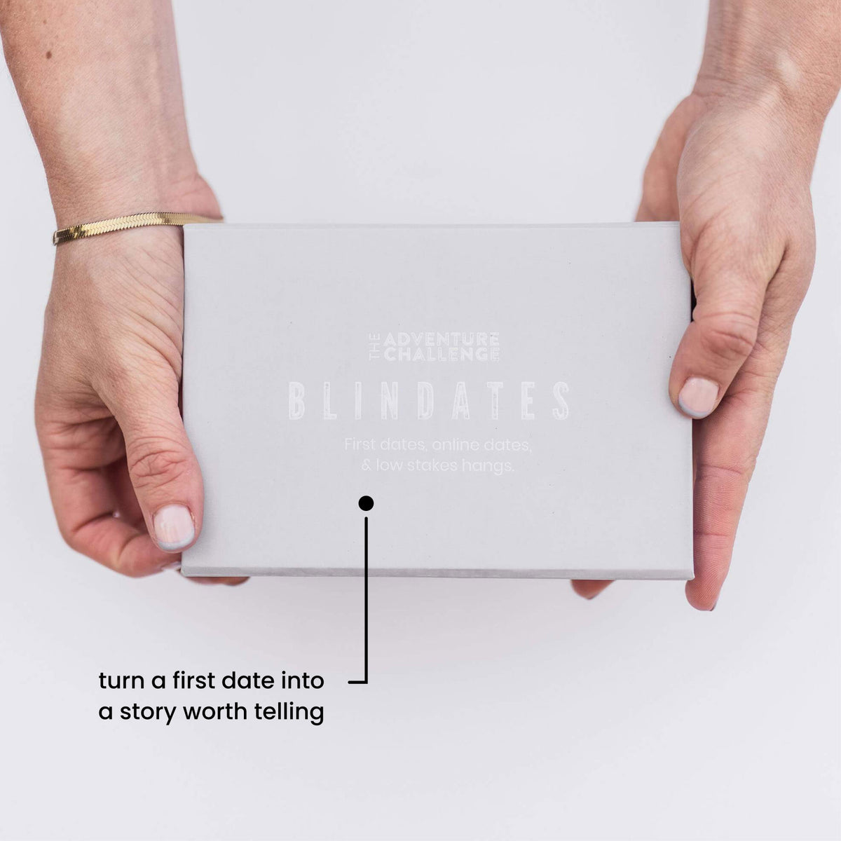 A couple revealing a Blind Dates scratch-off card